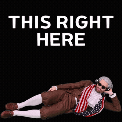 A Man In An American Flag Outfit Is Laying On The Ground With The Words This Right Here Behind Him GIF