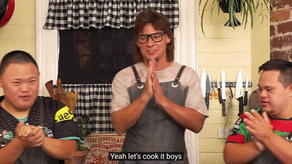 A Man In An Apron Says " Yeah Let 'S Cook It Boys " In Front Of Two Boys GIF
