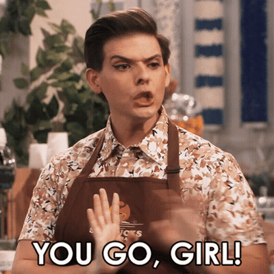 A Man In An Apron Says " You Go Girl " To A Child GIF