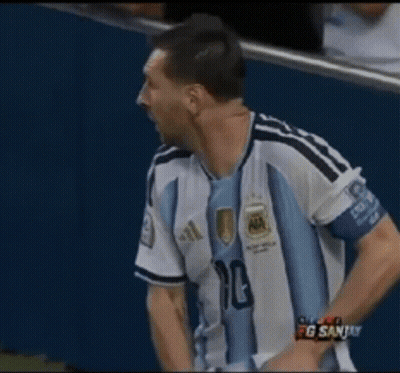 A Man In An Argentina Jersey Holds A Stack Of Money In His Hands GIF