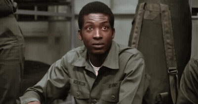 A Man In An Army Uniform Has The Name Robinson On His Chest GIF