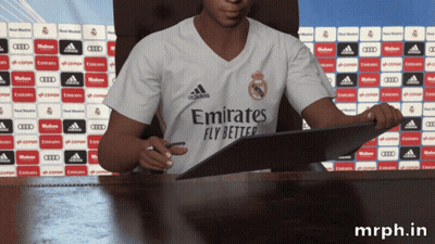 A Man In An Emirates Fly Better Shirt Signing A Contract GIF