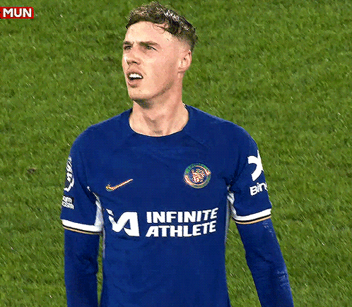 A Man In An Infinite Athlete Jersey Stands On A Soccer Field GIF