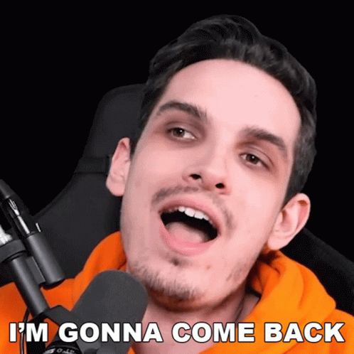 A Man In An Orange Hoodie Says " I 'M Gonna Come Back " In Front Of A Microphone GIF
