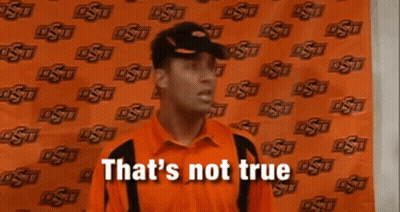 A Man In An Orange Shirt Says That 'S Not True In Front Of An Osu Background GIF
