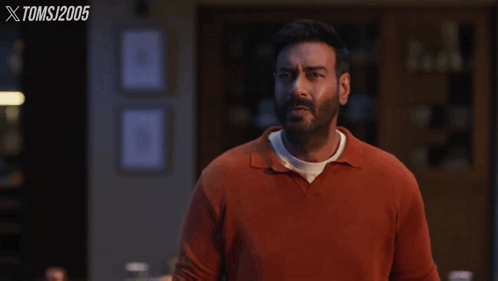 A Man In An Orange Shirt Says What Rubbish !! GIF
