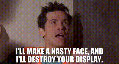 A Man In An Orange Vest Says I 'Ll Make A Nasty Face And I 'Ll Destroy Your Display . GIF