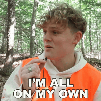 A Man In An Orange Vest Says " I 'M All On My Own " While Holding A Bug GIF