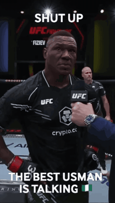 A Man In An Ufc Shirt Is Being Interviewed GIF