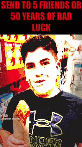 A Man In An Under Armour Shirt Holds A Fried Chicken Cone GIF