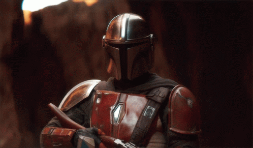 A Man In Armor Has A Badge On His Chest That Says ' A ' GIF