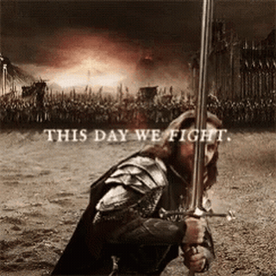 A Man In Armor Holding A Sword With The Words " This Day We Fight " Above Him GIF