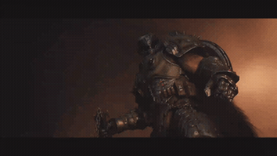A Man In Armor Is Holding A Sword GIF