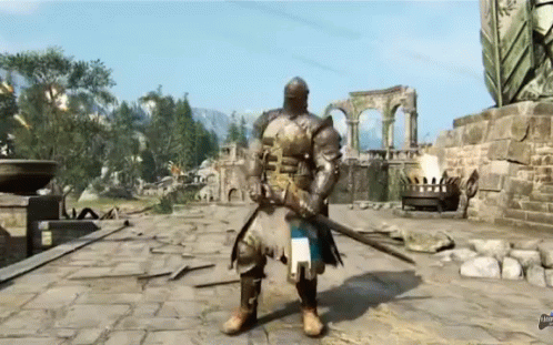 A Man In Armor Is Holding A Sword In Front Of A Ruined Building GIF