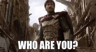 A Man In Armor Is Standing In A Ruined City With The Words Who Are You Behind Him GIF