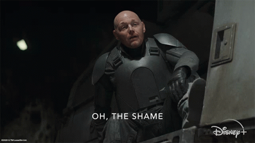A Man In Armor Says Oh The Shame In Front Of A Disney + Logo GIF