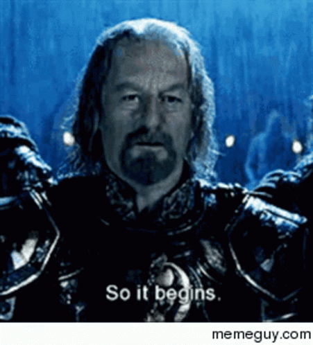A Man In Armor Says So It Begins In Front Of A Blue Background GIF