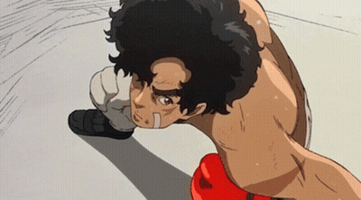 A Man In Boxing Gloves Is Kneeling Down GIF