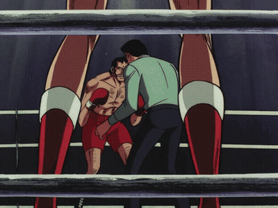 A Man In Boxing Gloves Stands In A Boxing Ring And Says Fight GIF