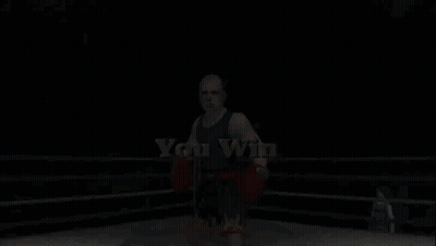 A Man In Boxing Gloves Stands In A Ring With The Words " You Win " On The Bottom GIF