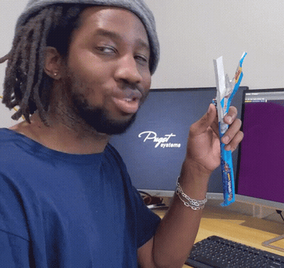 A Man In Front Of A Computer That Says Puget Systeme GIF