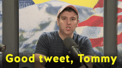 A Man In Front Of A Microphone With The Words " Good Tweet Tommy " Below Him GIF