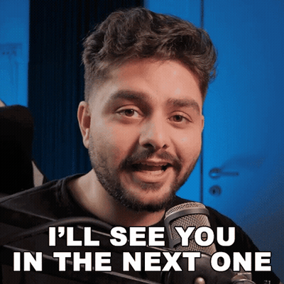 A Man In Front Of A Microphone With The Words I 'Ll See You In The Next One GIF