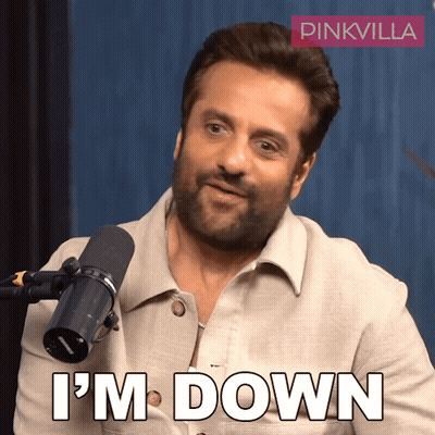 A Man In Front Of A Microphone With The Words I 'M Down On His Face GIF