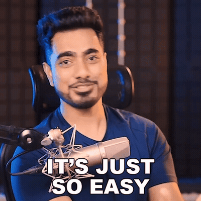 A Man In Front Of A Microphone With The Words It 'S Just So Easy GIF