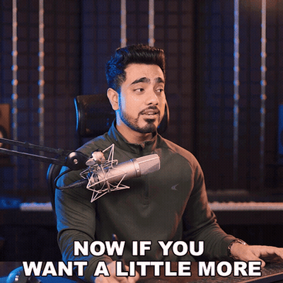 A Man In Front Of A Microphone With The Words Now If You Want A Little More Below Him GIF