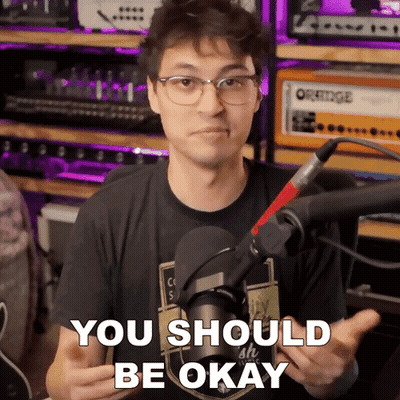 A Man In Front Of A Microphone With The Words You Should Be Okay Above Him GIF