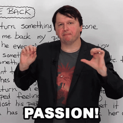 A Man In Front Of A White Board With The Word Passion Written On It GIF