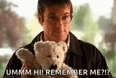 A Man In Glasses Is Holding A Teddy Bear And Saying `` Ummm Hi ! Remember Me ? '' . GIF