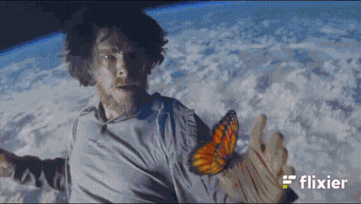 A Man In Space With The Word Flixier On The Bottom Left GIF