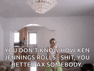 A Man In Sunglasses Is Standing In A Living Room With The Words " You Don T Know How Ken Jennings GIF