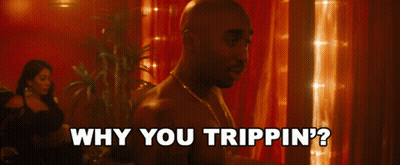A Man Is Asking Why You Trippin ' On A Red Background GIF