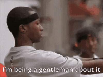 A Man Is Being A Gentleman About It While Wearing A Hat . GIF