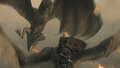 A Man Is Being Attacked By A Dragon In A Scene From A Movie GIF