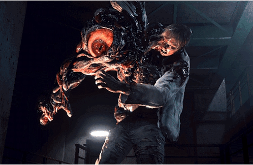 A Man Is Being Attacked By A Monster With A Large Mouth GIF