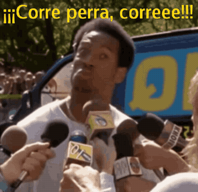 A Man Is Being Interviewed By A Bunch Of Reporters With The Words Corre Perra Correee Written On The Bottom GIF