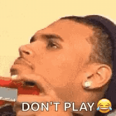 A Man Is Brushing His Teeth With A Toothbrush And Saying `` Don T Play '' . GIF