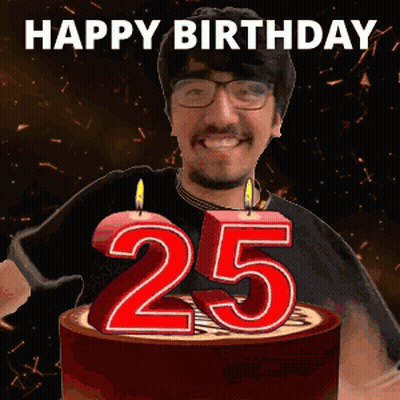 A Man Is Celebrating His 25Th Birthday By Blowing Out Candles On A Cake GIF