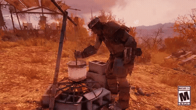 A Man Is Cooking Food On A Stove In The Desert . GIF