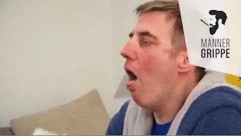 A Man Is Coughing With Manner Grippe Written On The Bottom GIF