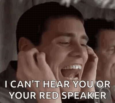 A Man Is Covering His Ears With His Hands While Laughing And Saying I Can 'T Hear You Or Your Red Speaker . GIF
