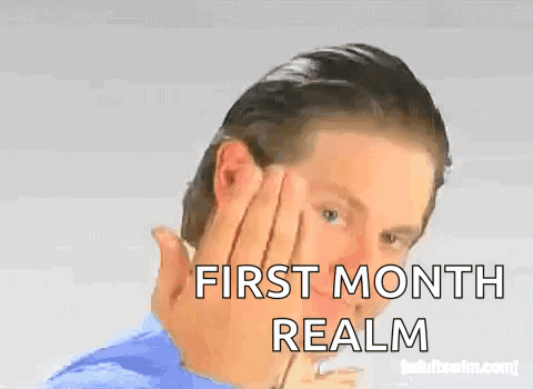 A Man Is Covering His Face With His Hand And The Words First Month Realm Are On The Bottom GIF