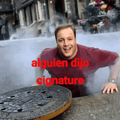 A Man Is Crawling Out Of A Manhole Cover With The Words " Alguien Dijo Signature " In Red GIF