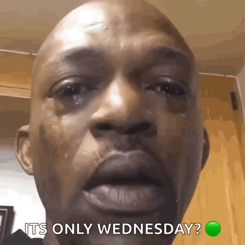 A Man Is Crying And Says It 'S Only Wednesday . GIF