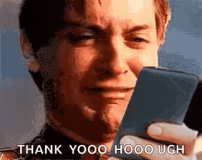 A Man Is Crying While Holding A Cell Phone And Says `` Thank You , Hooo Ugh '' . GIF