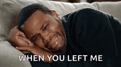 A Man Is Crying While Laying On A Couch And Says `` When You Left Me '' . GIF
